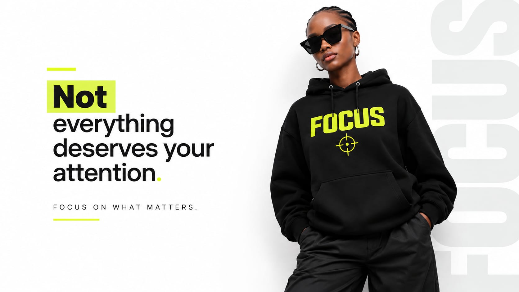 Woman in a black Focus hoodie, not everything deserves your attention